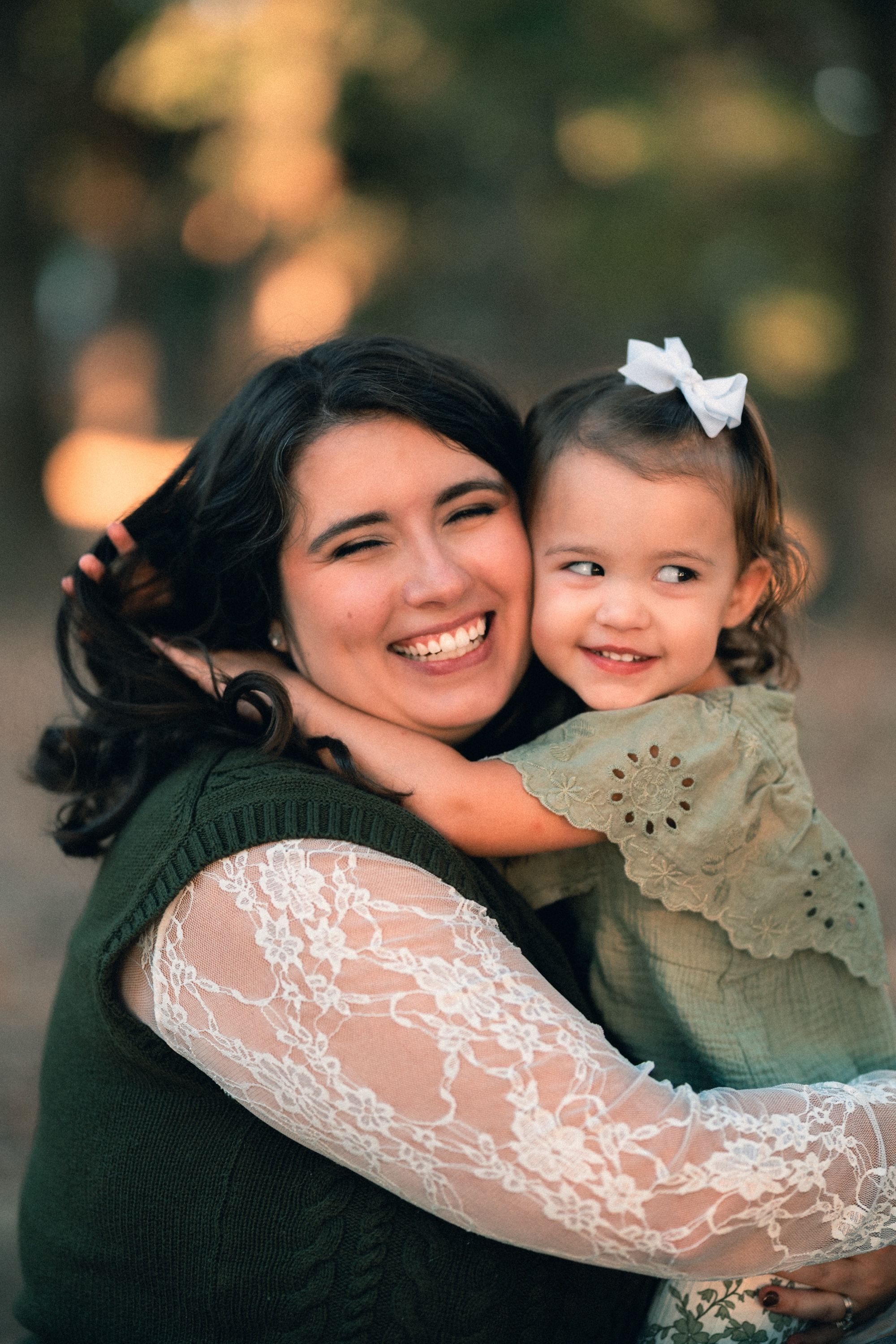 Mother and child cheek to cheek, Memphis family photography by Atkinson Studio