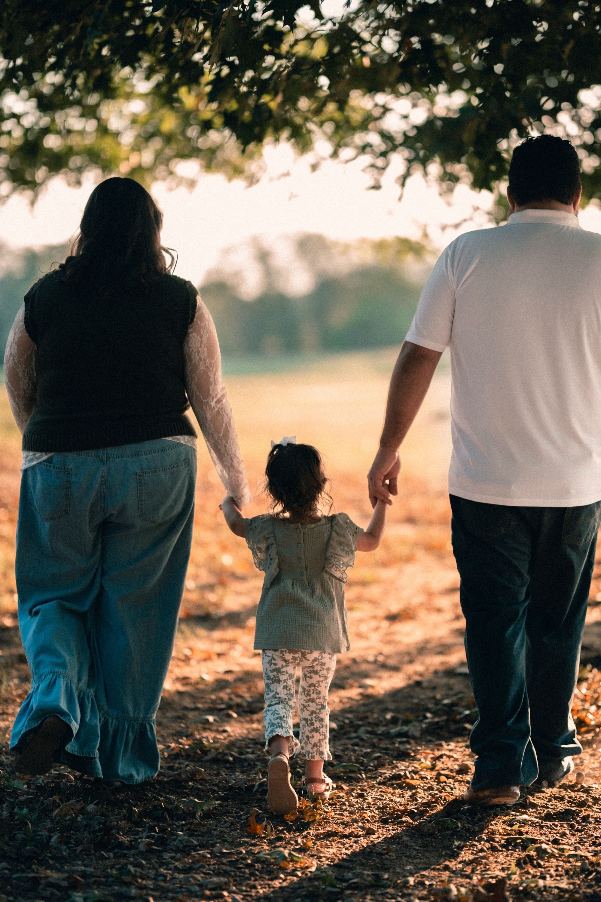 Family walking hand in hand, Memphis family photography by Atkinson Studio