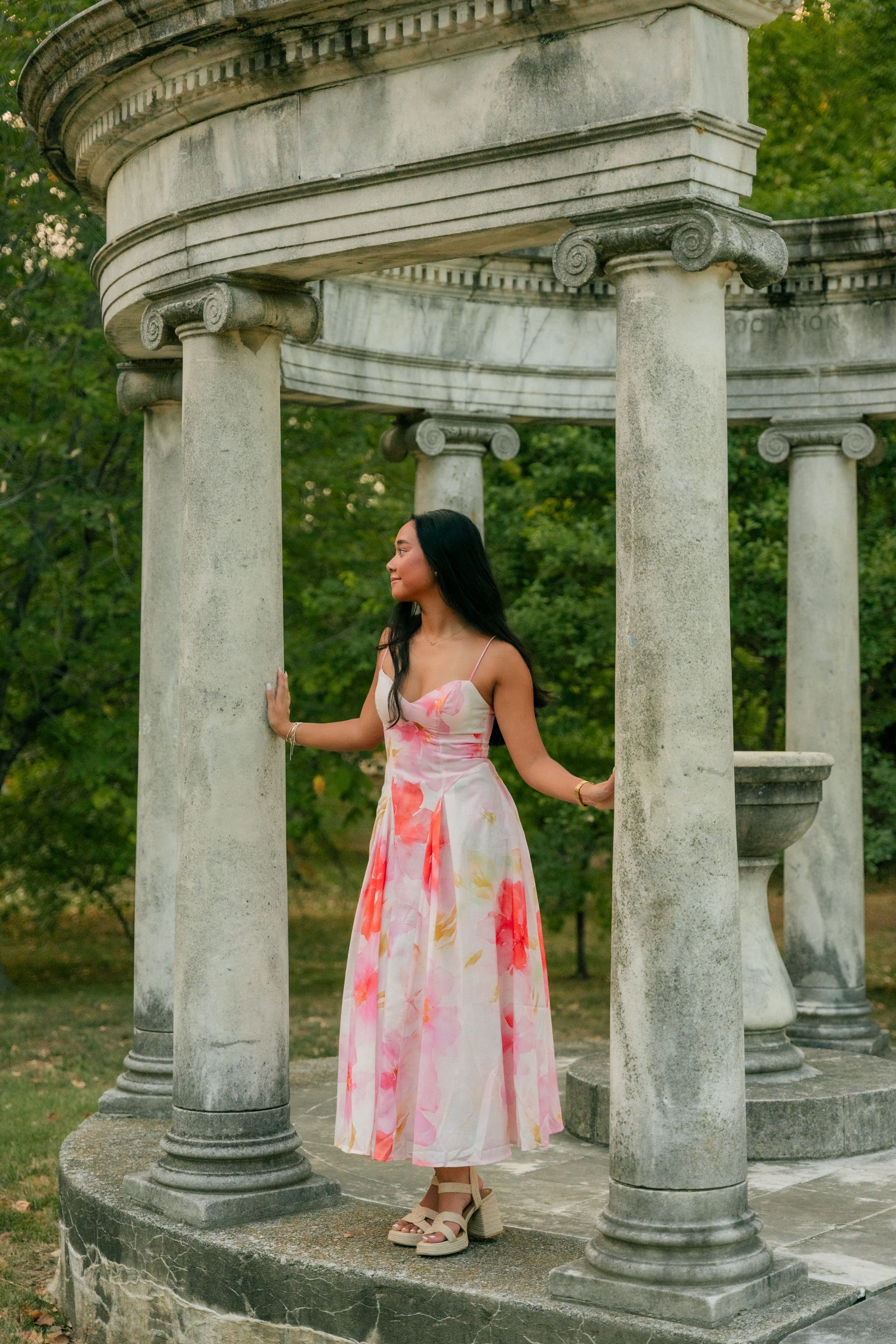 Senior portrait framed by a classical stone colonnade, Memphis senior portraits by Atkinson Studio