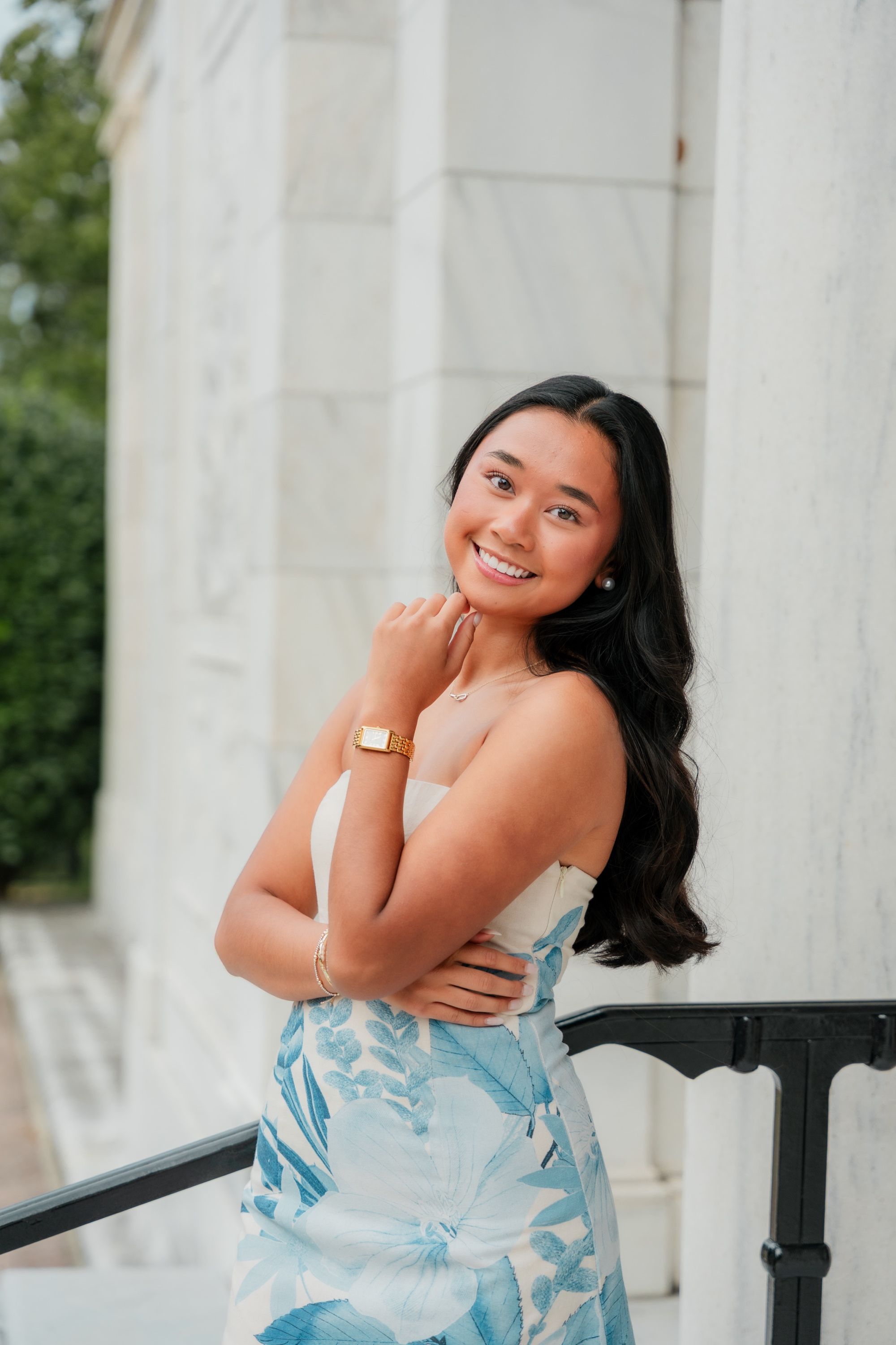 Editorial senior portrait between marble columns, Memphis senior portraits by Atkinson Studio