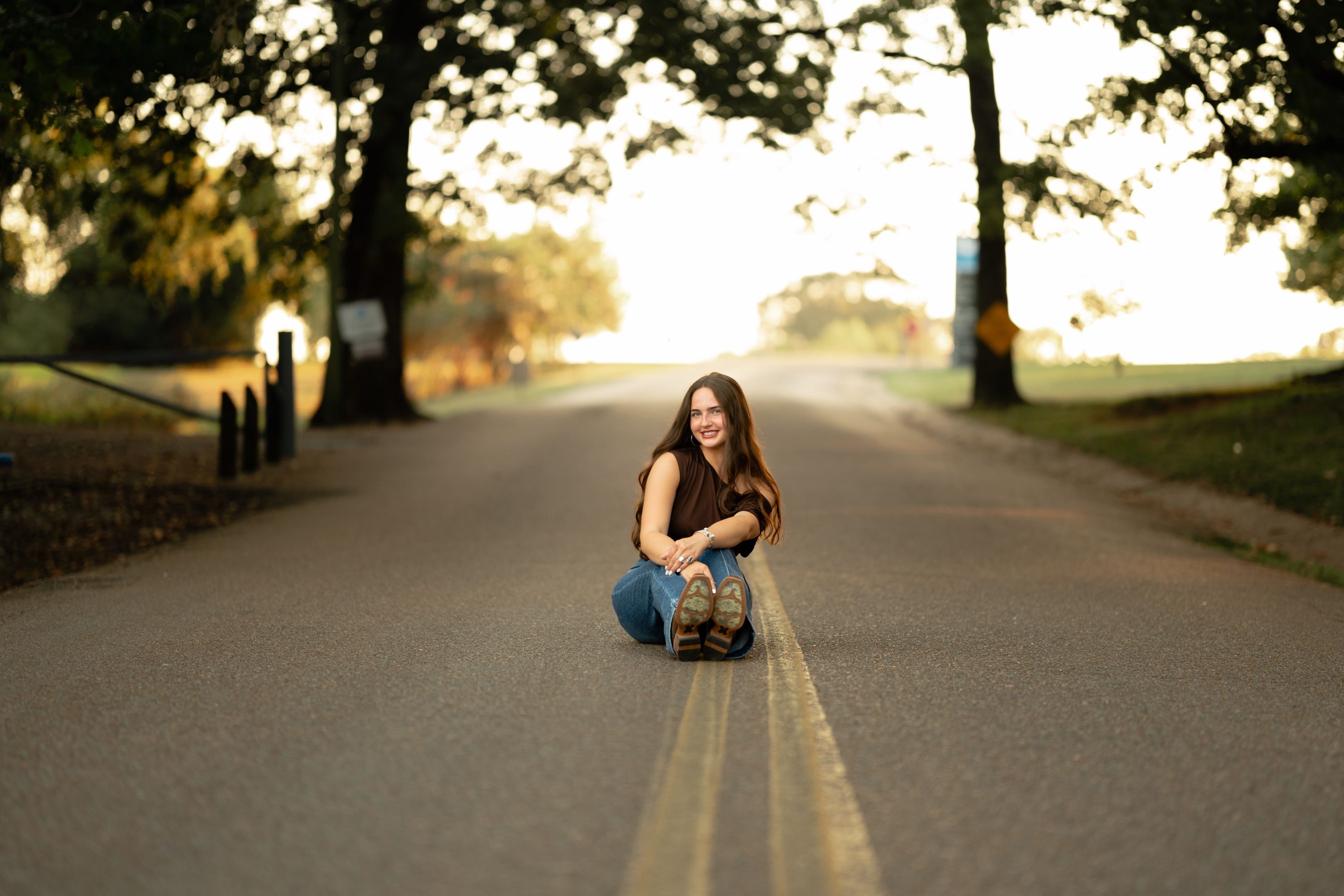 Senior portrait on a country road at sunset, Memphis senior portraits by Atkinson Studio