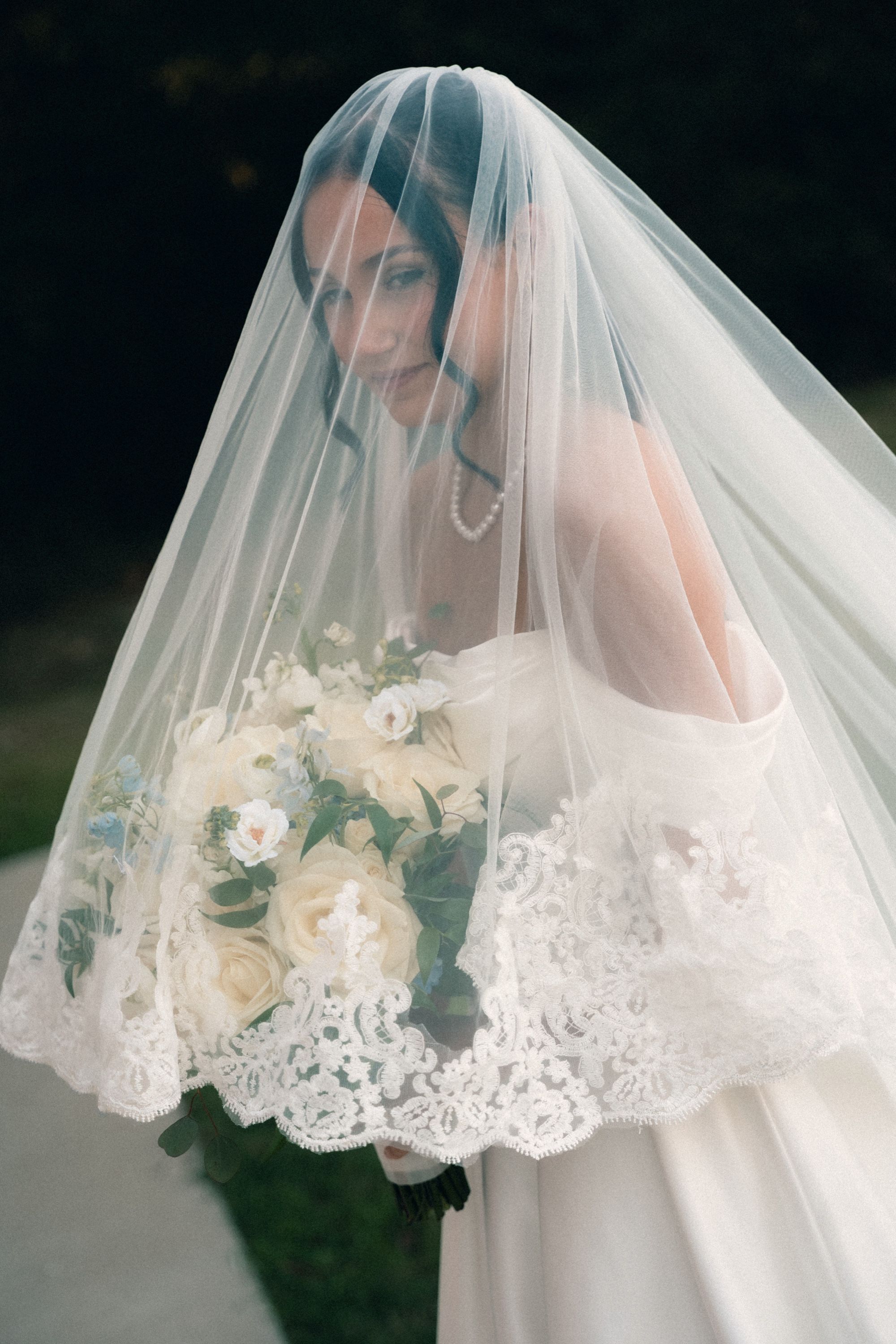 Bride beneath a lace veil at Salt Chapel, Memphis wedding photography by Atkinson Studio