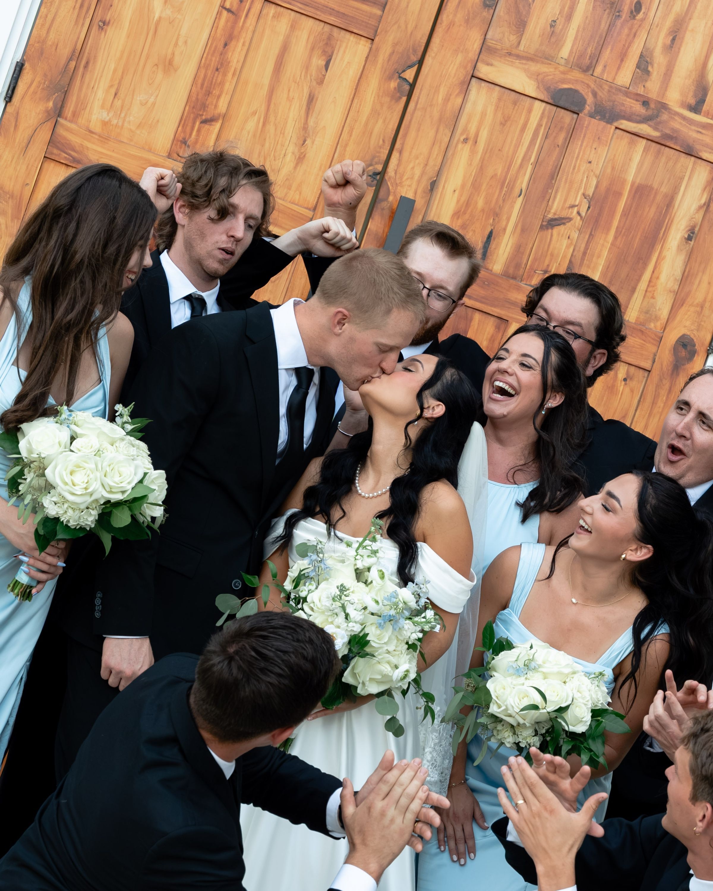 Wedding party cheering together, Memphis wedding photography by Atkinson Studio