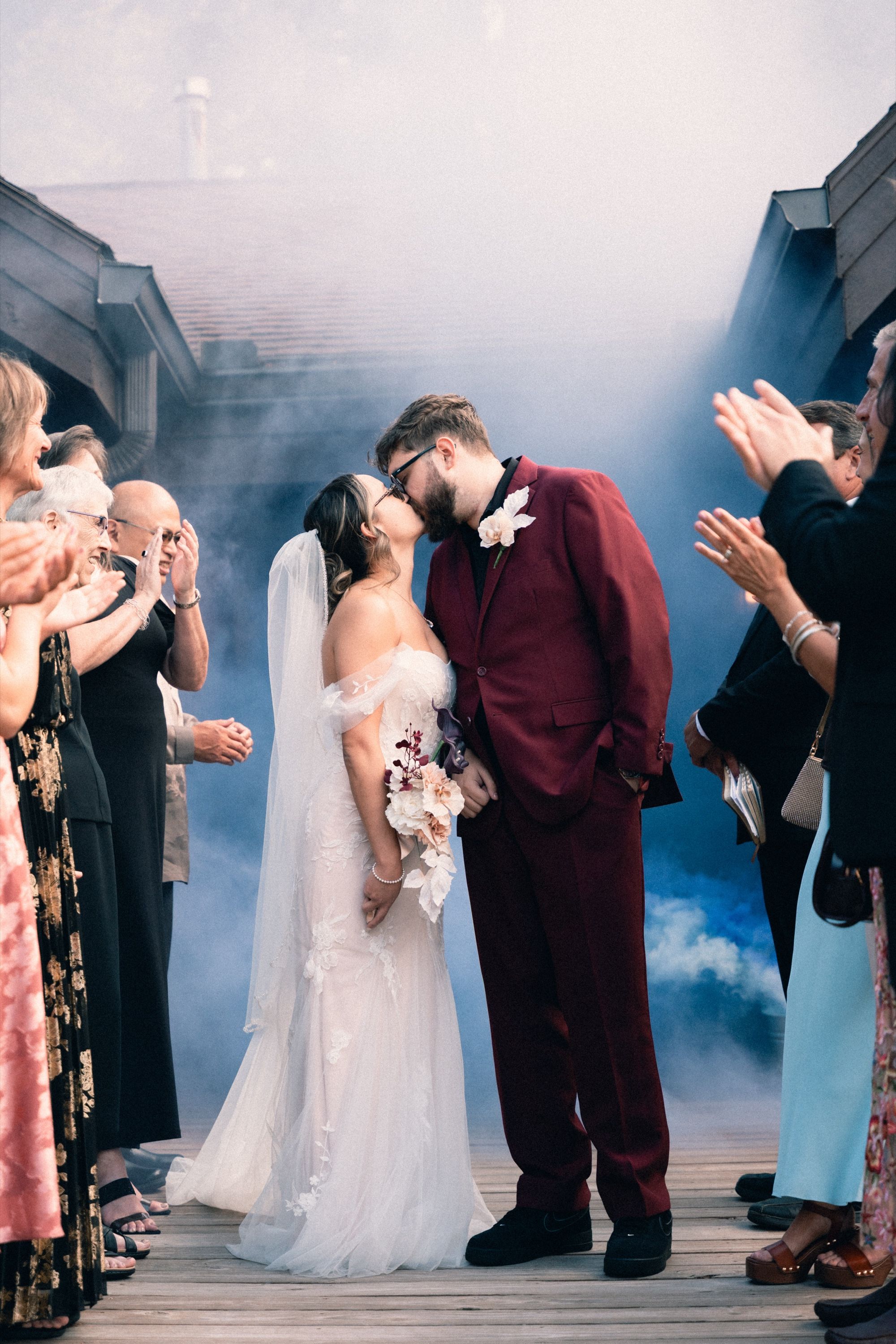 Newlyweds' grand exit through coloured smoke, Memphis wedding photography by Atkinson Studio