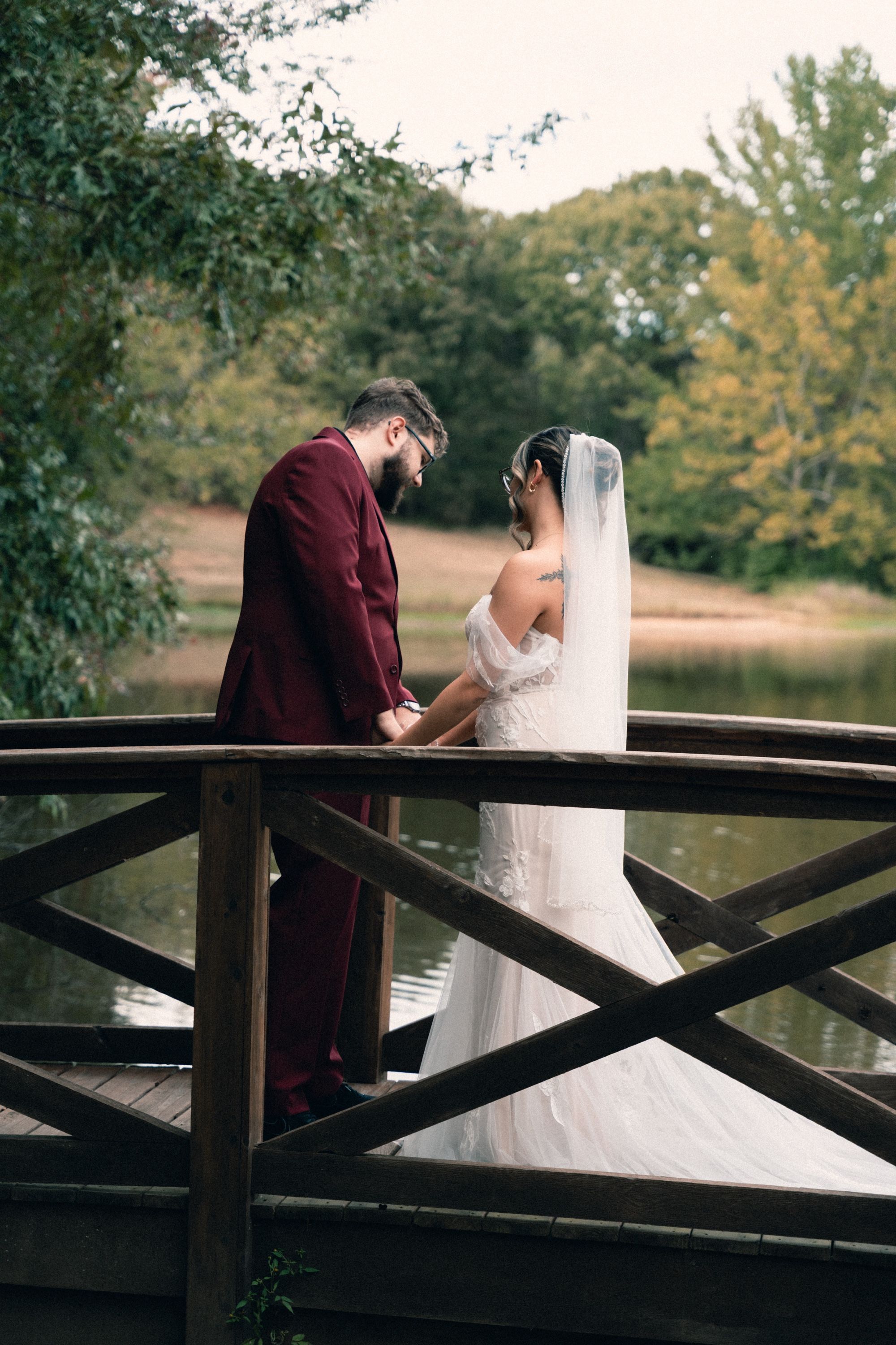 Bride and groom on a bridge, Memphis wedding photography by Atkinson Studio