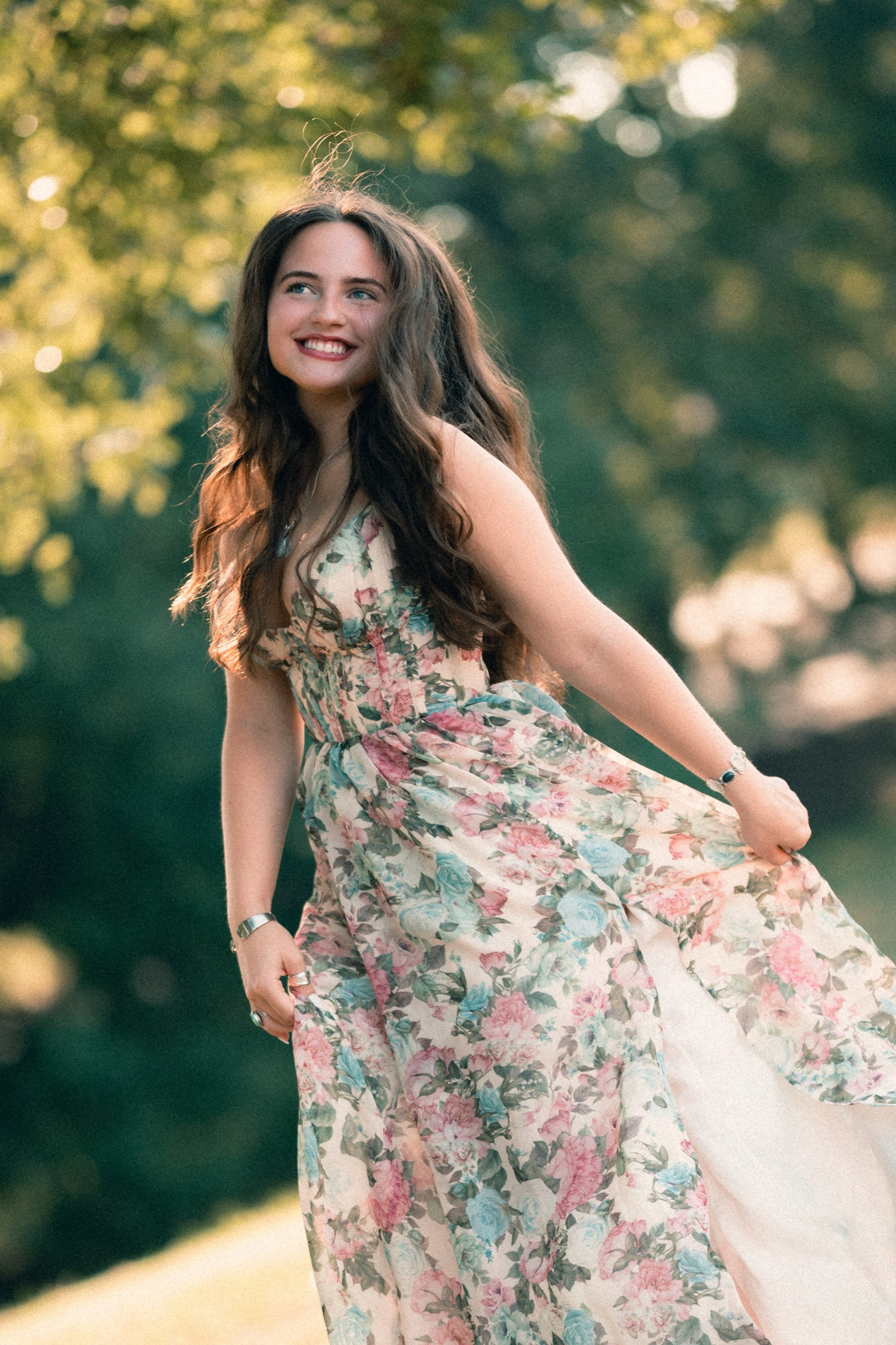 Senior laughing in a golden field, Memphis senior portraits